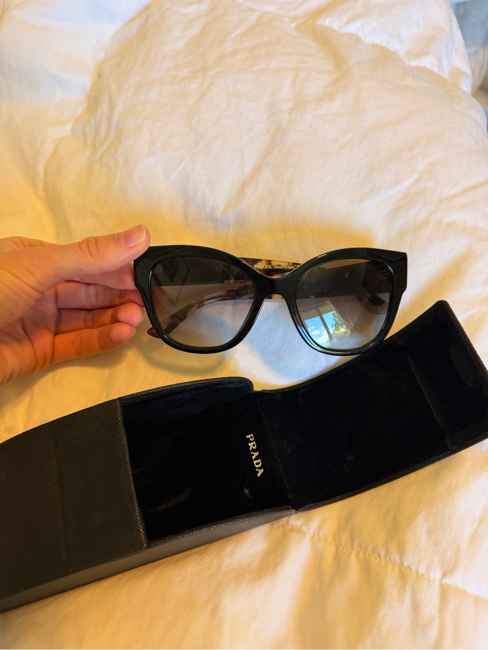 Prada Black Cat-Eye Sunglasses with Gradient Lenses